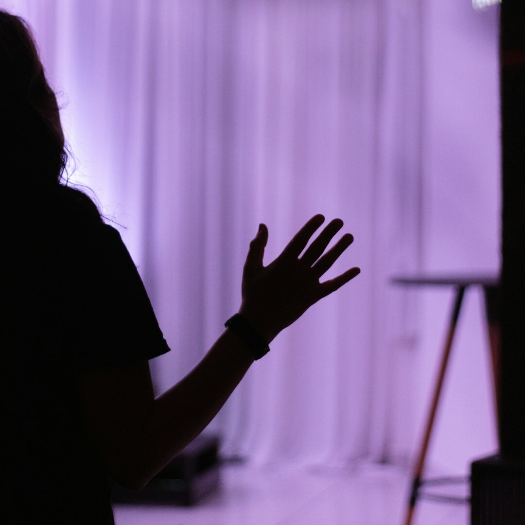 Professional woman giving a presentation at a business conference